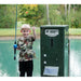 Boy holding a fishing rod and caught fish next to the American Feeder H125 Outdoor Feeder with solar panel at a pond