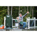 Man and boy fishing from a dock next to the American Feeder H125 Fish Feeder with a fresh caught bluegill
