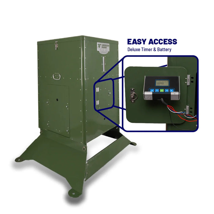American Feeder S300 Deer Feeder access door open showing the digital deluxe timer controller and battery compartment