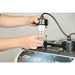 Hands removing the serviceable UV unit from the Evolution Aqua Nexus EAZY 220 Titanium for easy tool-free maintenance