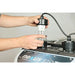 Hands removing a serviceable titanium UV lamp from the Evolution Aqua Nexus EAZY 320 Titanium Pond Filter control lid