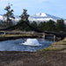 kasco_surface_aerator_in_water_with_mountains_in_background
