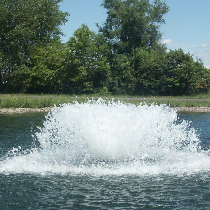 kasco_surface_aerator_in_water_with_trees_in_background
