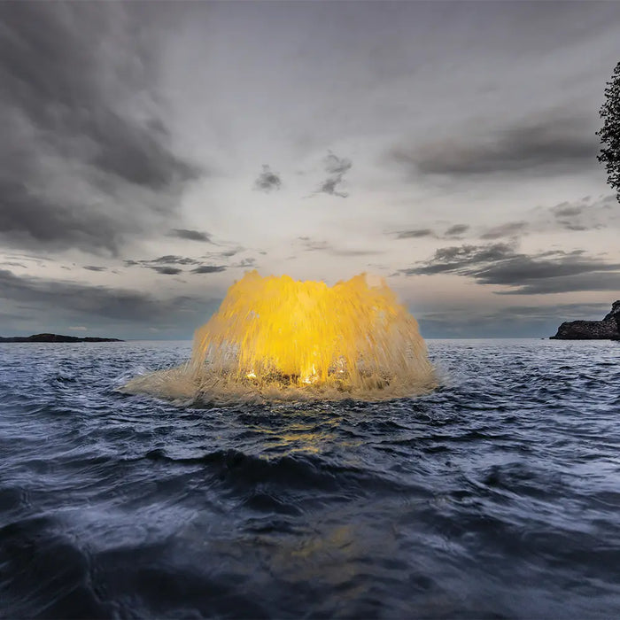 kasco_surface_aerator_with_golden_lighting_in_open_water_at_dusk