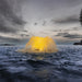 kasco_surface_aerator_with_golden_lighting_in_open_water_at_dusk