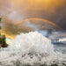 kasco surface aerator creating splash pattern with rainbow over water