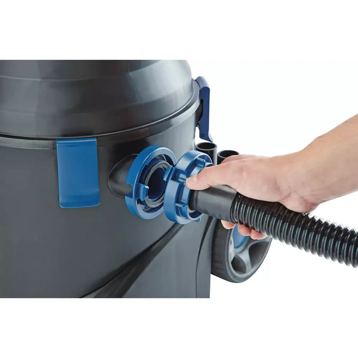 Hand attaching the discharge hose to the blue C-connection coupler on the Oase PondoVac 5 Spare Parts tank pressure side