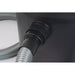 Close-up of the Oase PondoVac Classic pond vacuum plug connection with the grey suction hose fitted into the tank inlet