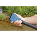 Hand holding the Oase PondoVac Classic blue variable universal nozzle showing the 2 mm to 10 mm adjustable gap markings
