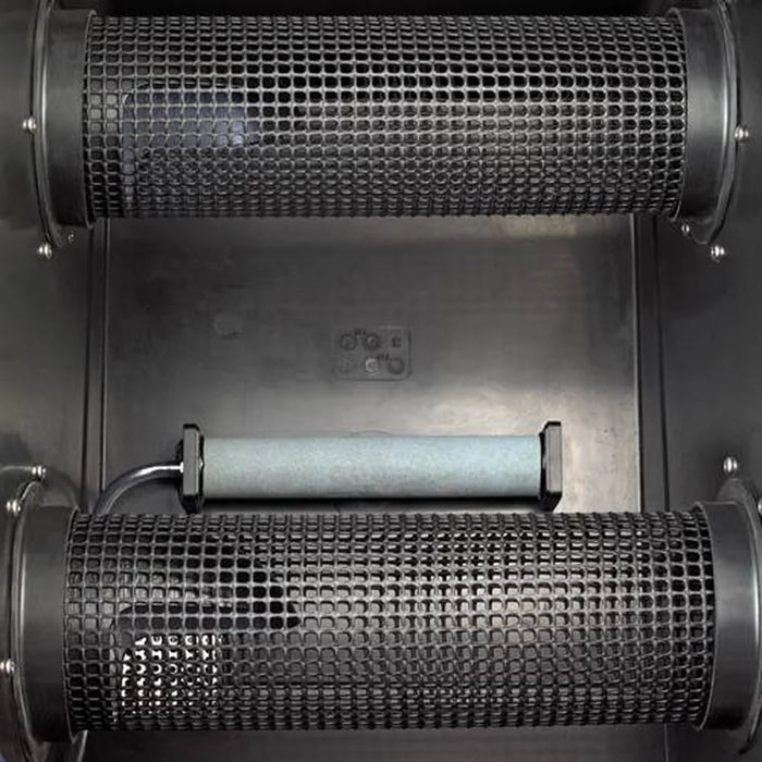Two mesh media cylinders and central aerator bar in the Oase ProfiClear Premium Moving Bed Module Filtration System