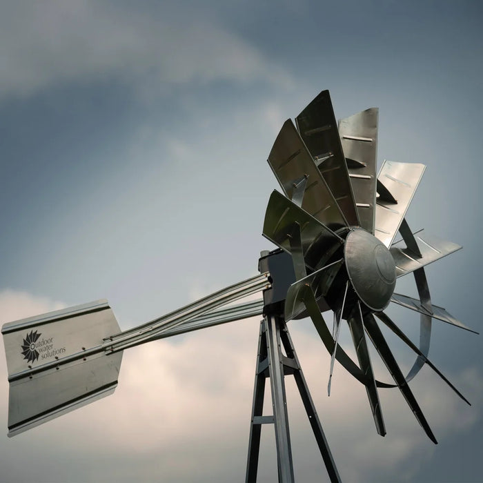 Close-up of the galvanized head and tail fin on the Outdoor Water Solutions Steel Windmill Aerator 3 Leg