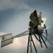 Close-up of the galvanized head and tail fin on the Outdoor Water Solutions Steel Windmill Aerator 3 Leg