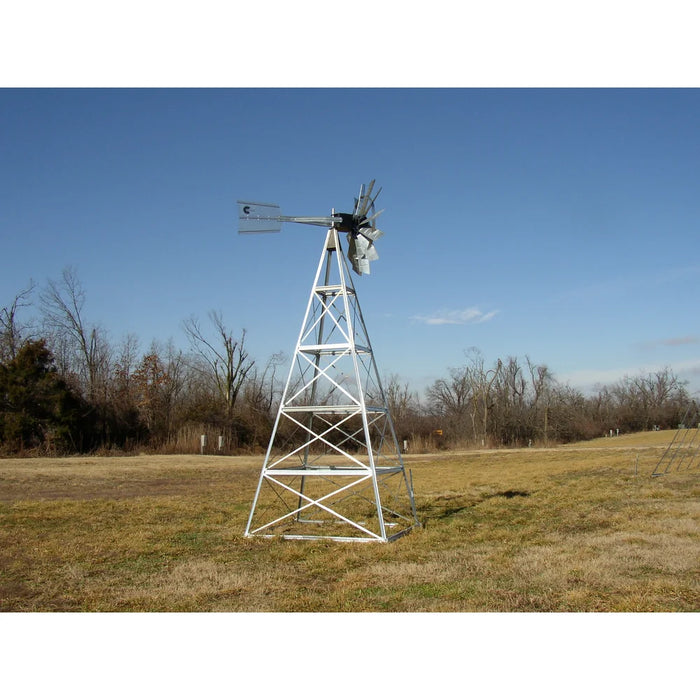 Outdoor Water Solutions Steel Tower Windmill Pond Aerator galvanized 4 leg tower standing in an open field