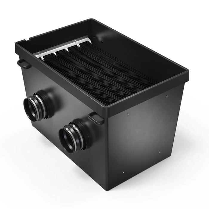 Open black chamber packed with upright wavy media panels in the ProfiClear Premium XL Standing Bed Module Moving Bed Filter