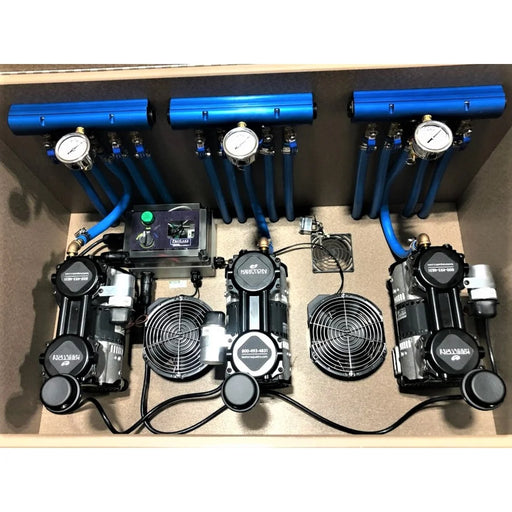 Interior of the ProLake3 Electric Aeration Unit showing three compressors, cooling fans, blue manifolds and pressure gauges