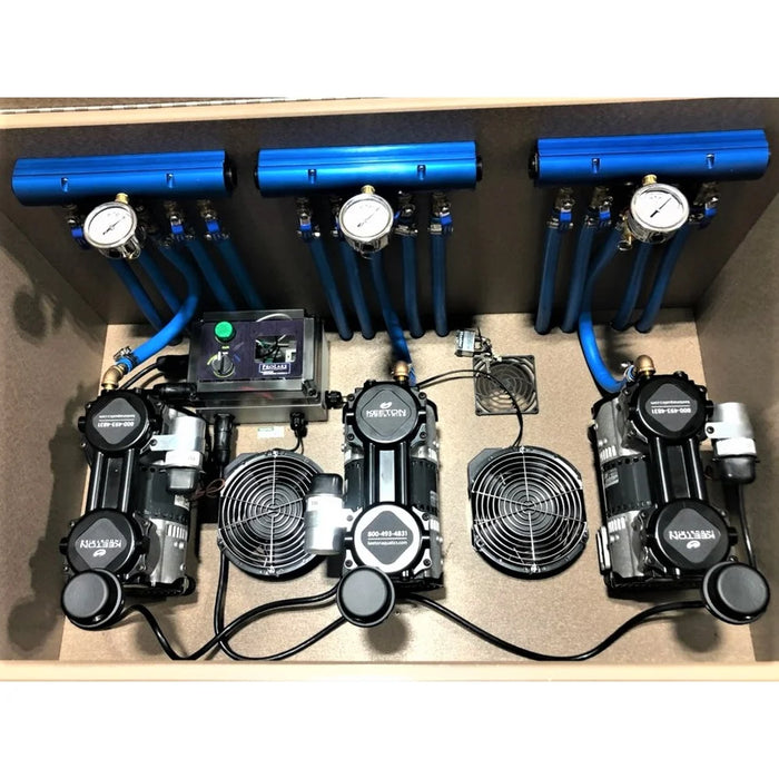 Interior of the ProLake3 Electric Aeration Unit showing three compressors, cooling fans, blue manifolds and pressure gauges