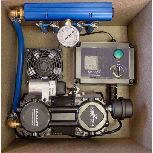 Interior of the ProLake ProLake¹ 1.2 Pond Aerator cabinet showing compressor, manifold, pressure gauge, cooling fan and timer