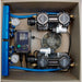 Interior of the ProLake 2.8 Aeration System cabinet with two compressors, cooling fan, programmable timer, gauges and blue manifolds
