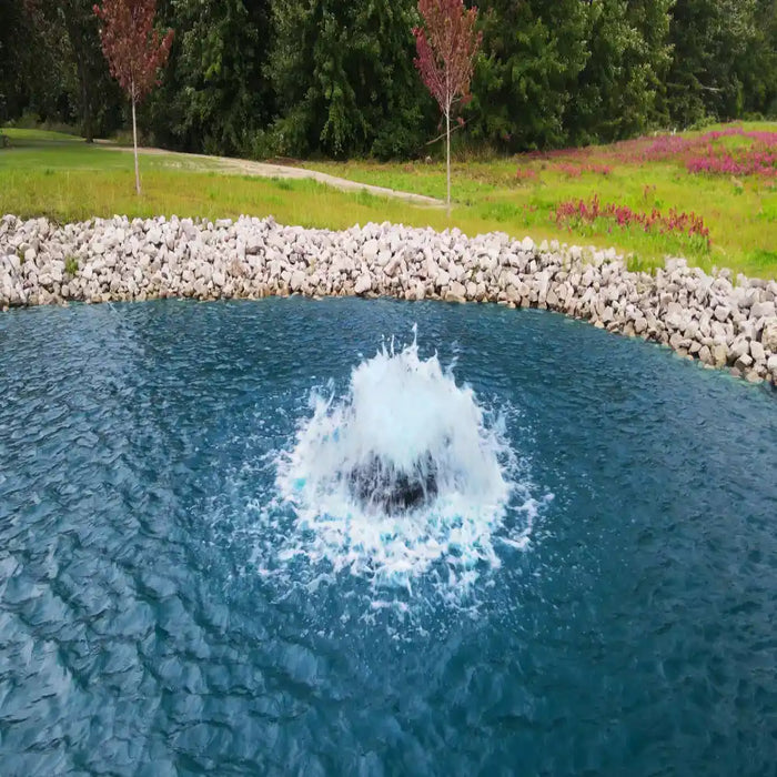 scott_aerator_boilermaker_in_water_with_rocks_and_trees_in_background