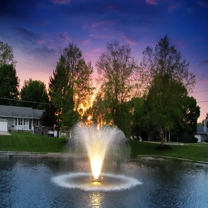 scott_aerator_warm_white_led_night_glo_pond_fountain_lights_in_water_with_trees_in_background