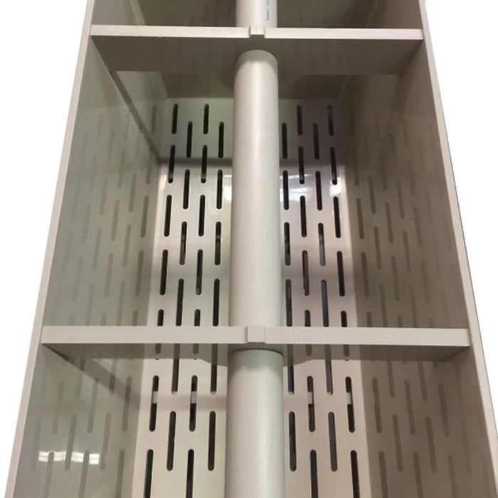 Interior look into the Sea Side Aquatics Medium 38 Inch Bakki Shower Filter showing slotted drainage tray floors and the central water inlet pipe