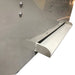 Waterfall spillway lip and riveted distribution tray edge on the Sea Side Aquatics Waterfall Bakki Shower 60 Inch koi pond filter