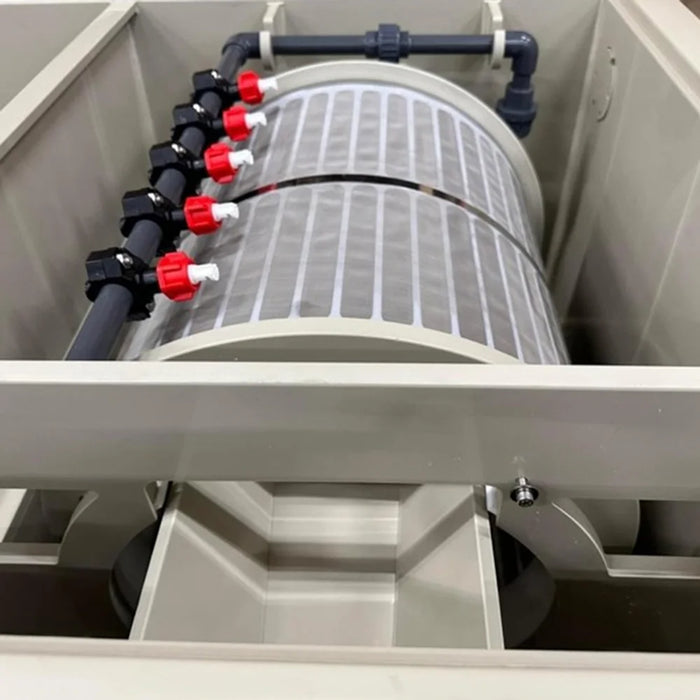 Close-up of the Sea Side Aquatics C22-TF RDF Filter drum showing fine mesh screening and the red and white spray rinse valves