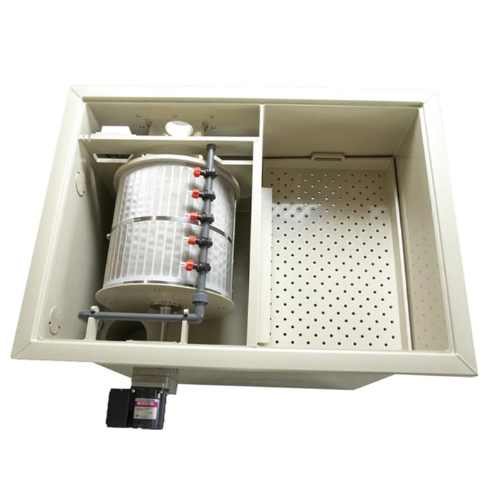 Open tank interior of the Sea Side Aquatics C22-TF Drum Filter showing the mesh rotating drum, spray valves and perforated media tray