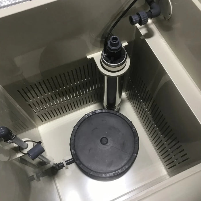 Close-up of the stainless steel cleaning pump inside the Sea Side Aquatics Entry C25 LOW Drum Filter bio chamber