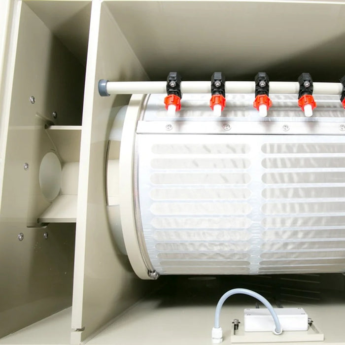 Interior stainless steel drum screen and spray bar of the Sea Side Aquatics PP-35 WIFI inside the filter housing