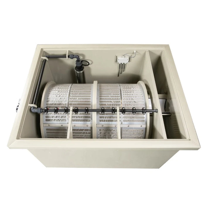 Interior view of the Sea Side Aquatics PP100-WIFI Pond Filter rotating drum with stainless screen, spray bar and pump piping