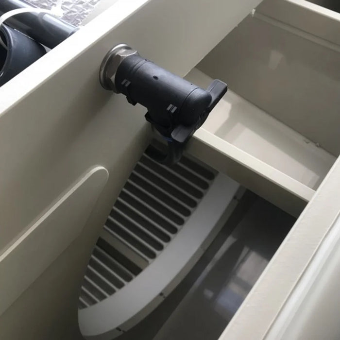 Interior spray nozzle above the curved drum screen of the Sea Side Aquatics PP65-WIFI RDF Filter during automatic rinsing