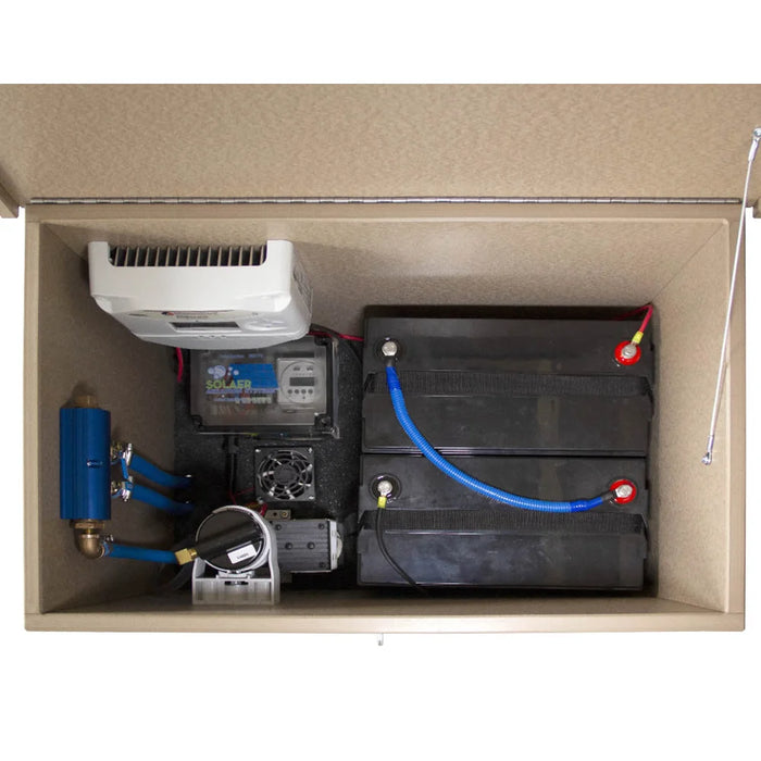 Inside view of the Solaer® Solar Aerator cabinet showing batteries, compressor, controller and manifold